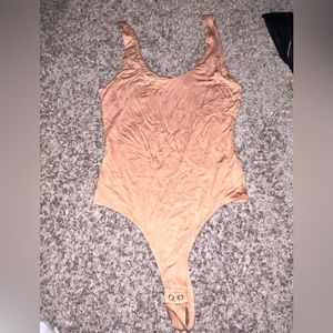 Peach thong bodysuit